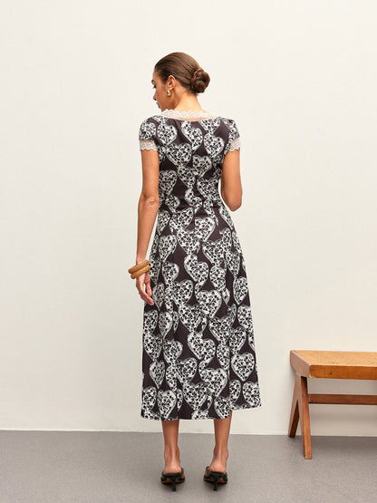 Çiçek Desenli V Yaka Fiyonk Bağlamalı Elbise